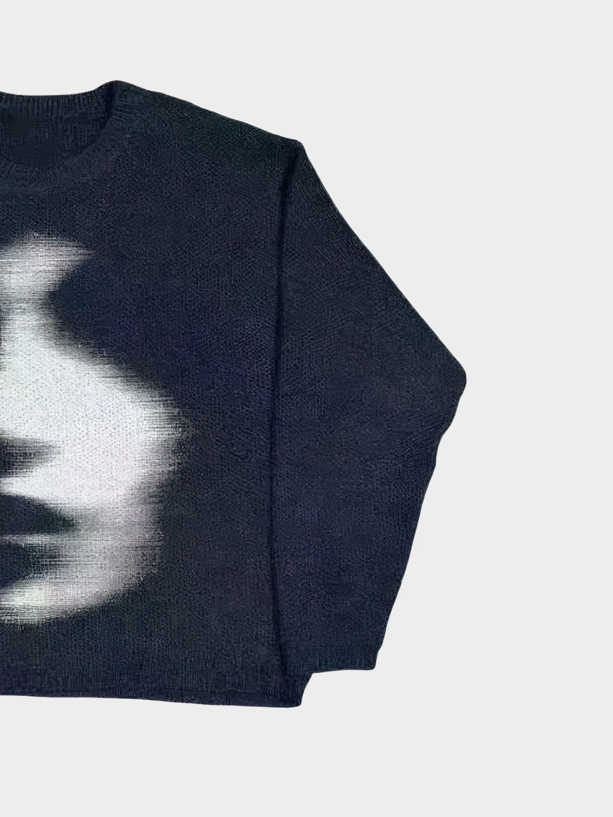 Riven Knit le visage flou